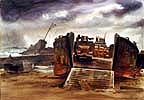 A wreaked landing craft on the beach